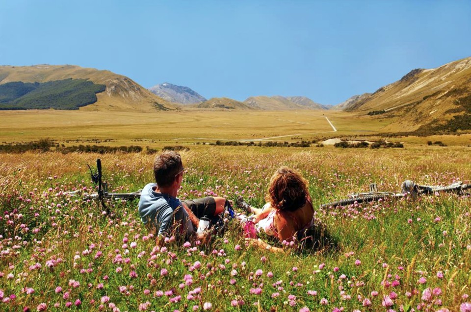 Around the Mountains couple relaxing credit Venture Southland