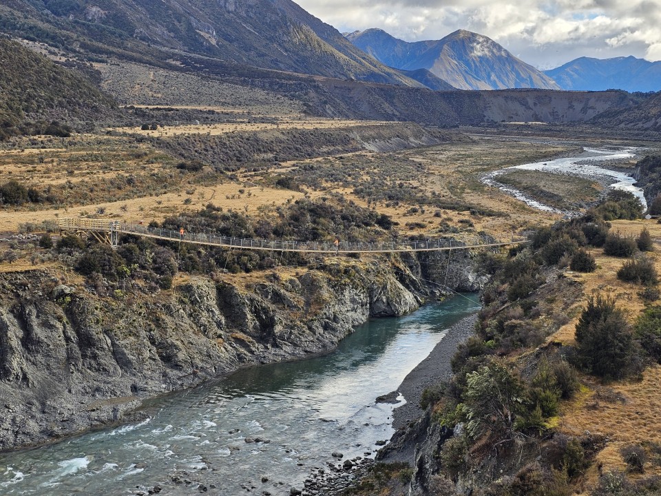 McArthur bridge with mountains landscape DOC